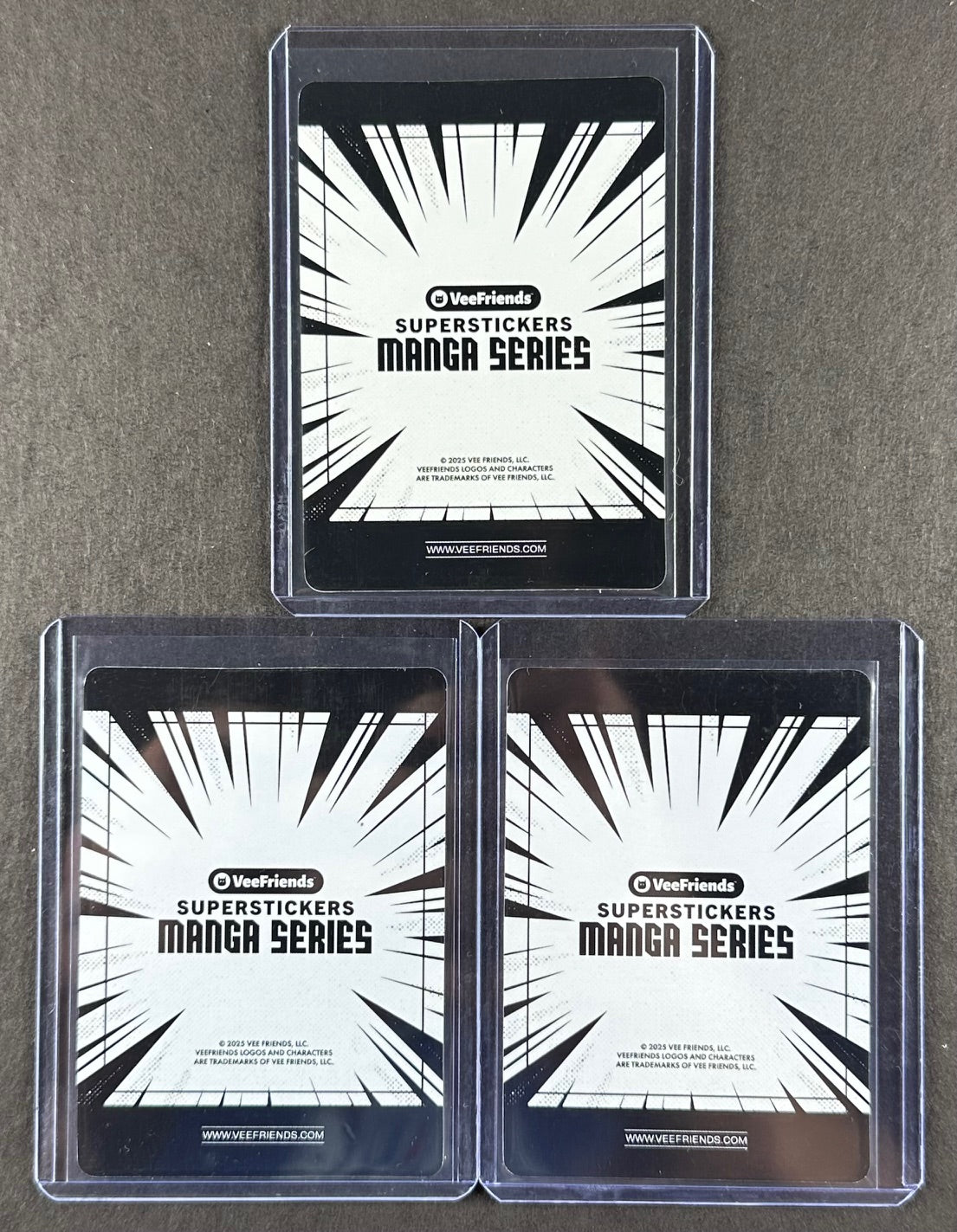 VeeFriends Super Stickers – Considerate Cowboy 3-Card Bundle – Green Splash /99 + Orange Splash /199 + Manga Clouds /399