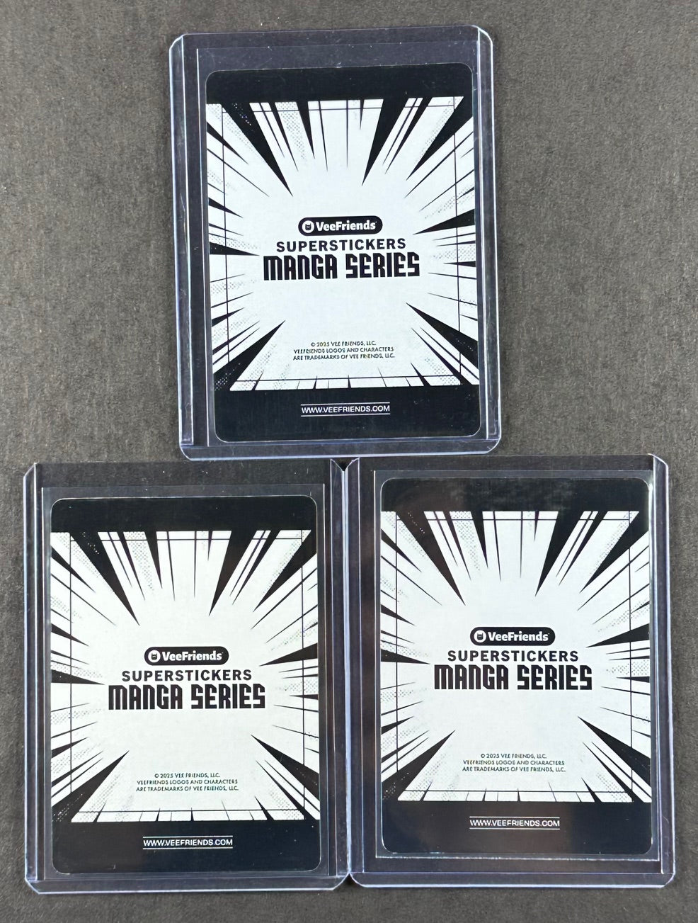 VeeFriends Super Stickers – Articulate Armadillo 3-Card Bundle – Purple Splash /55 + Orange Splash /199 + Manga Blue Burst /299