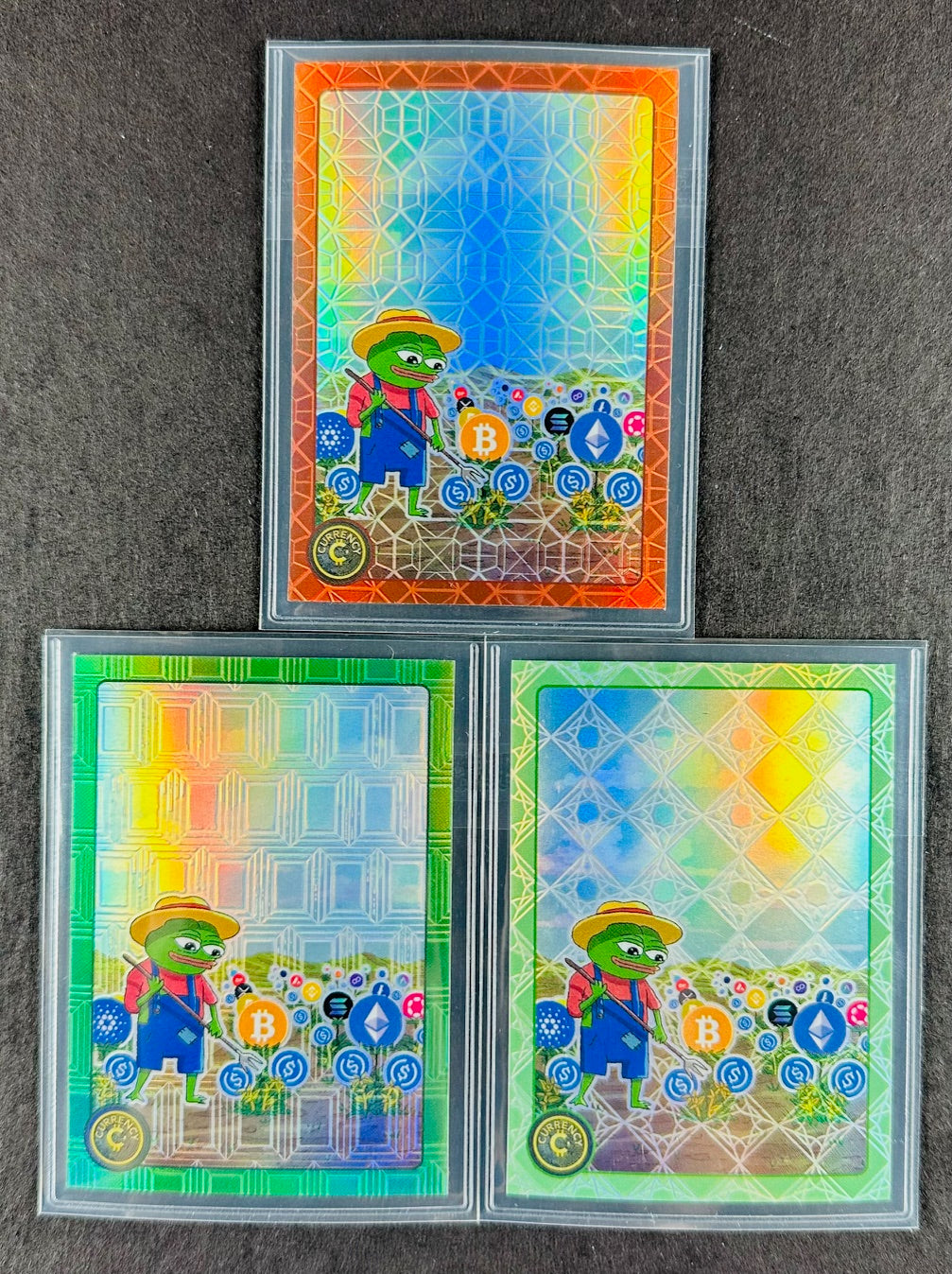 Cardsmiths Series 4 – Yield Farming #17 – Garnet 13/75, Emerald 30/99, Jade 12/45 (3-Card Bundle)