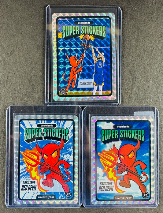 VeeFriends Super Stickers – Resilient Red Devil 3-Card Bundle – Blue Splash /299 + Manga Clouds /399 + Curry Crossover