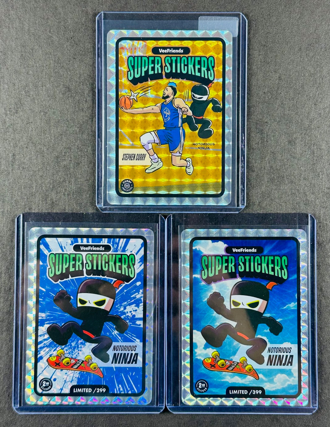 VeeFriends Super Stickers – Notorious Ninja 3-Card Bundle – Blue Splash /299 + Manga Clouds /399 + Curry Crossover