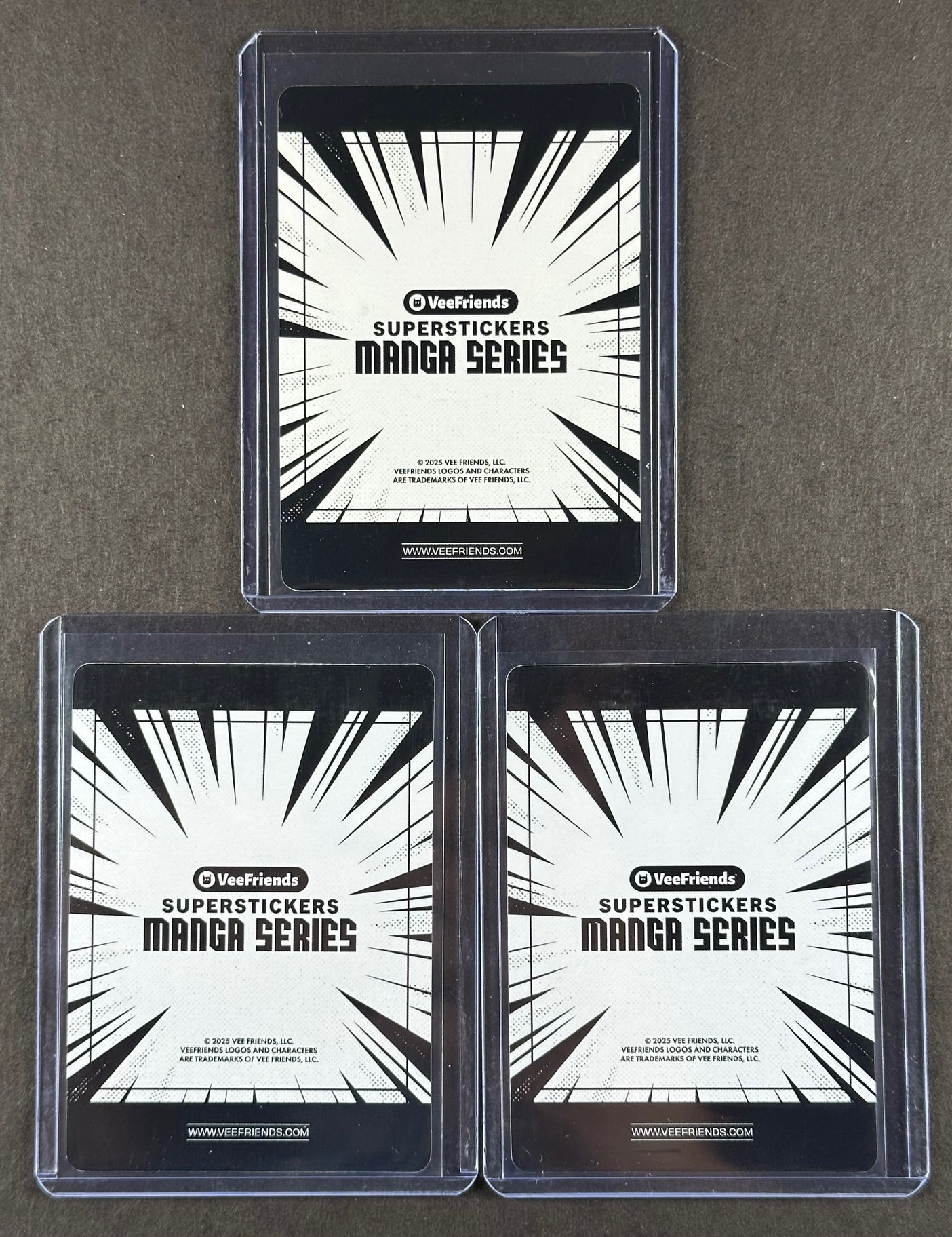 VeeFriends Super Stickers – Compassionate Catfish 3-Card Bundle – Purple Splash /55 + Orange Splash /199 + Manga Clouds /399