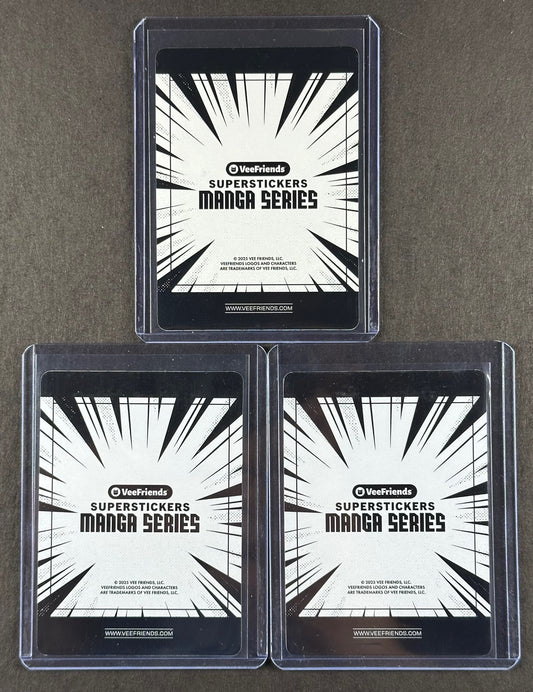 VeeFriends Super Stickers – Compassionate Catfish 3-Card Bundle – Purple Splash /55 + Orange Splash /199 + Manga Clouds /399