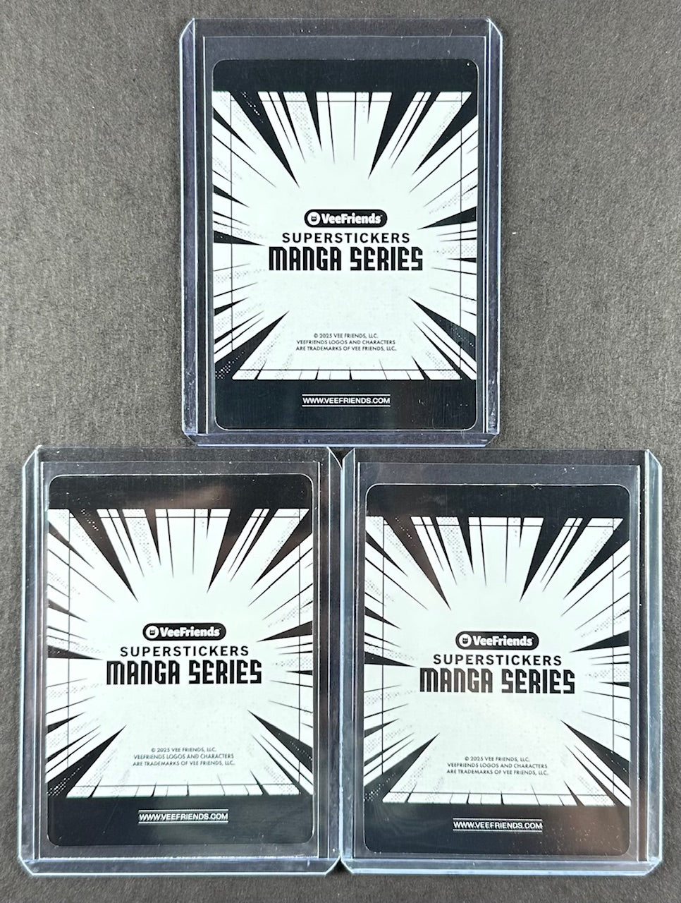 VeeFriends Super Stickers – Headstrong Honey Badger 3-Card Bundle – Purple Splash /55 + Orange Splash /199 + Manga Clouds /299