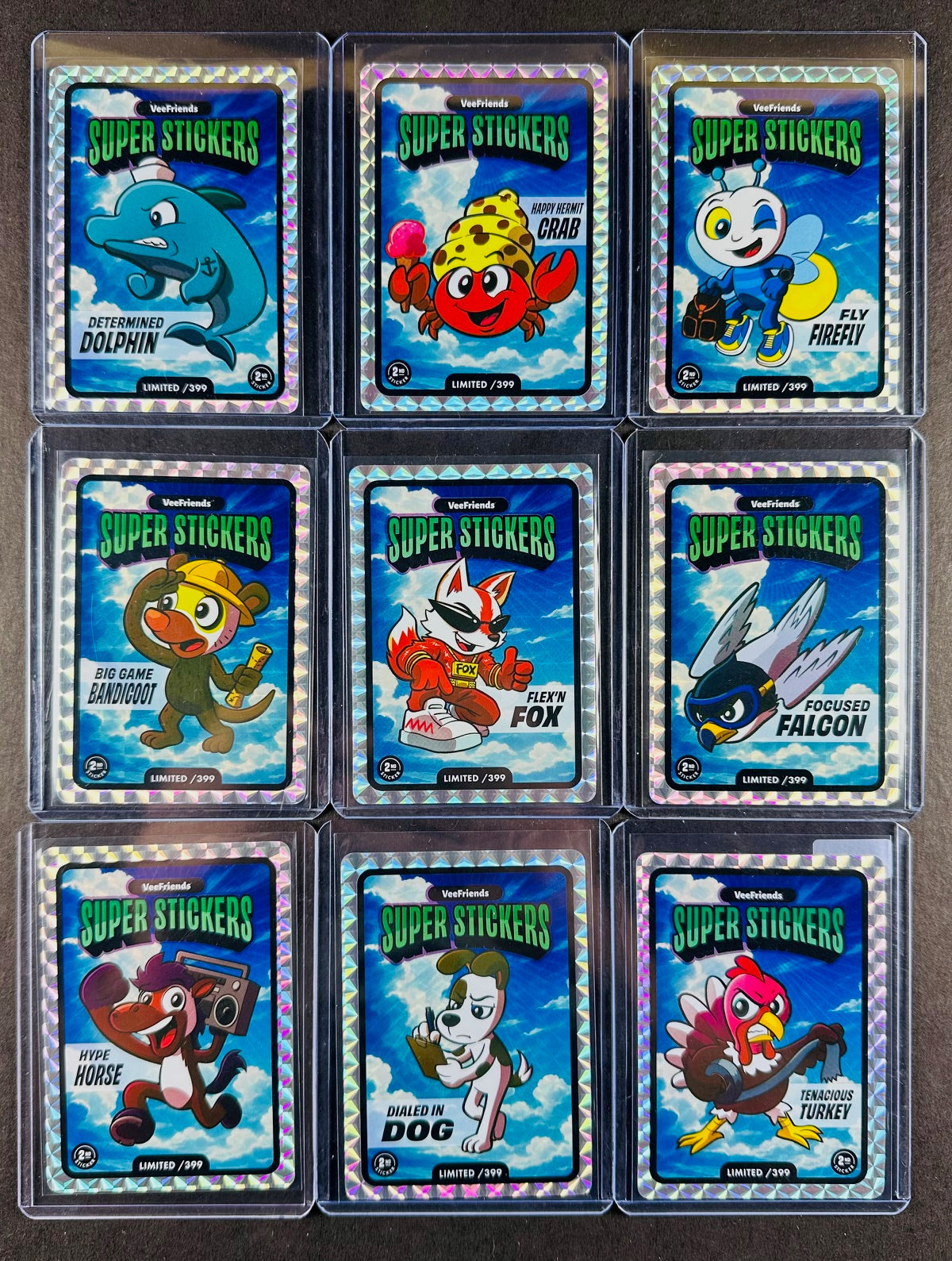 VeeFriends Super Stickers – 9-Card Manga Cloud Bundle – Determined Dolphin + Happy Hermit Crab + Fly Firefly + Big Game Bandicoot + Flex’n Fox + Focused Falcon + Hype Horse + Dialed In Dog + Tenacious Turkey